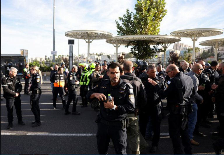 Two Hamas gunmen open fire at Jerusalem bus stop, killing three