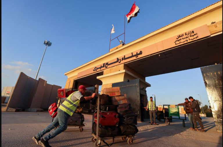 Back to a war zone: stranded Palestinians head home to Gaza during truce