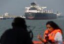 India says Iran assures safe Hormuz passage for its tankers; Tehran source disputes claim