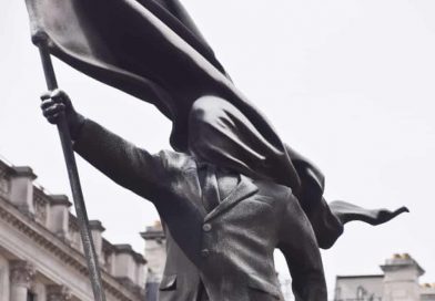 Banksy Unveils New London Sculpture of Flag-Bearing Figure in Westminster